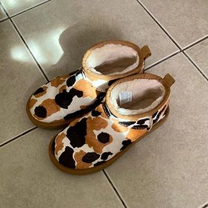 Cow print mini Uggs